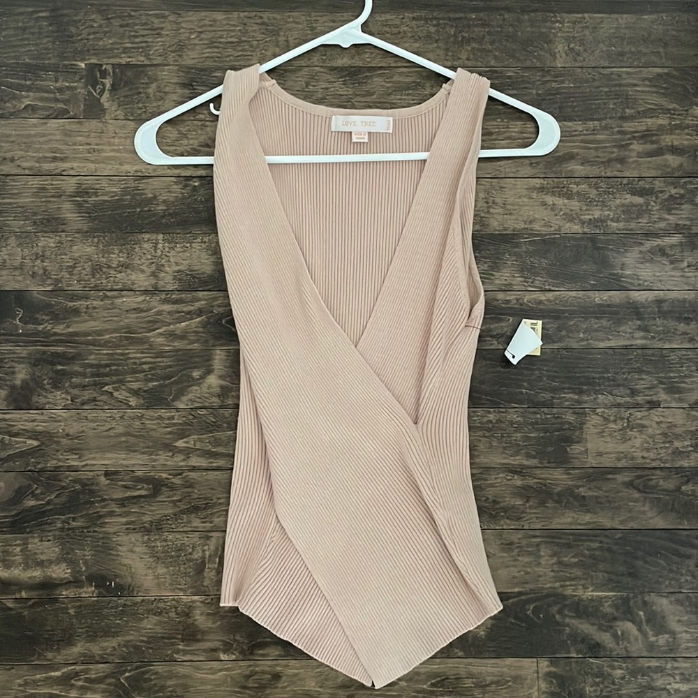 Cream rubbed tank with overlap in front. Purchased, but never wore.